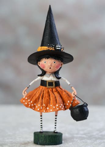 Make Your Halloween Decor Stand Out with a Witch Figurine and Stakes